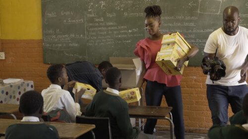 Thembisa Mdoda, Proverb And Lira Donate School Shoes around Gauteng