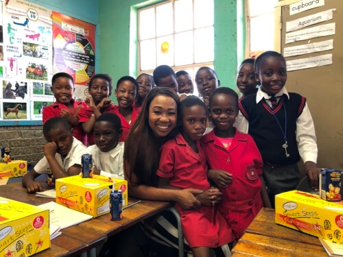 Dineo Ranaka with pupils at Thembalihle Primary School 2019