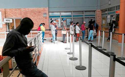 Students queue at a NSFAS office in Johannesburg